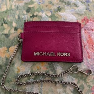 Michael’s Kors card hold with chain.